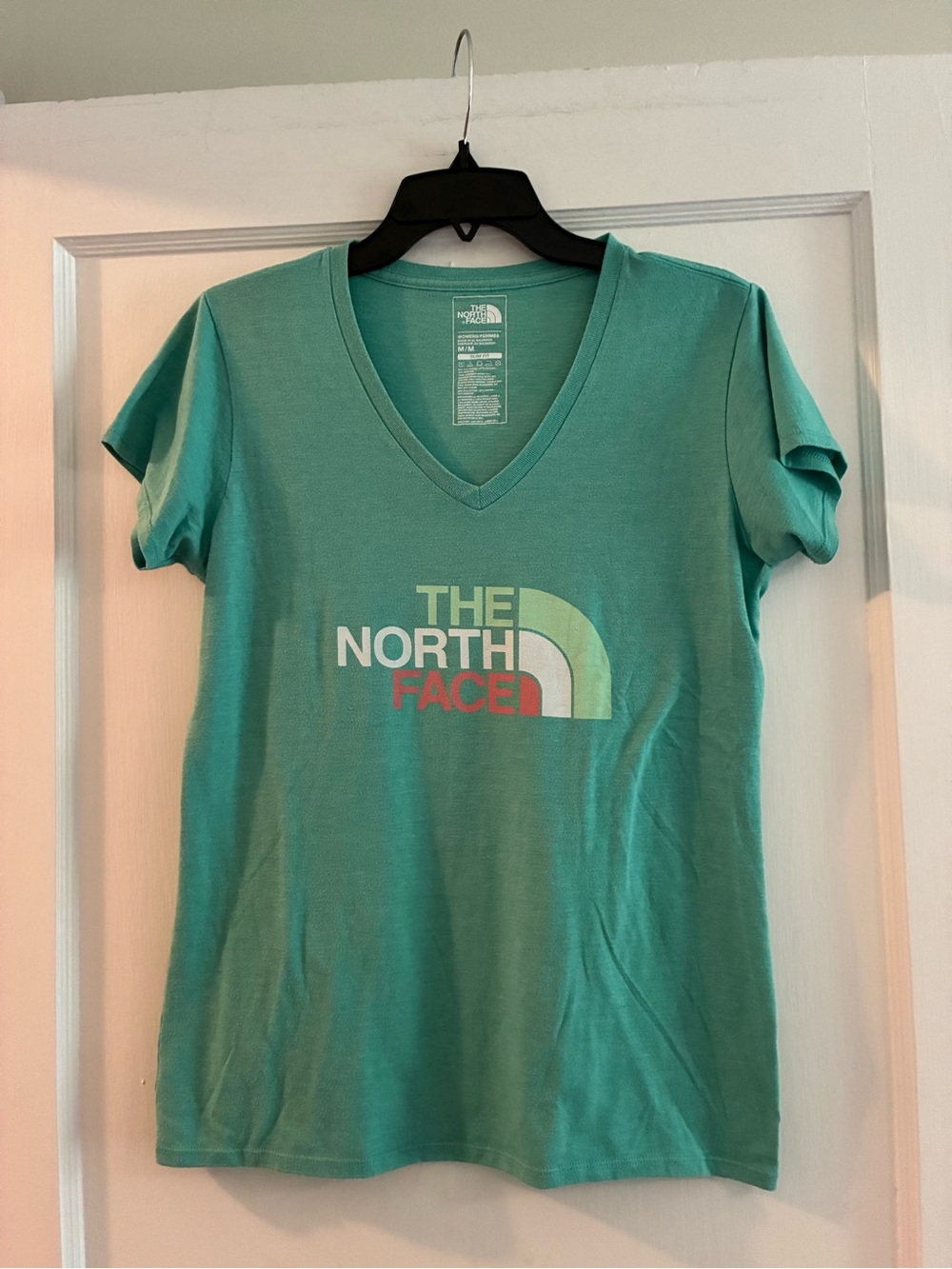 The North Face Women’s V-Neck Logo Tee in Teal M